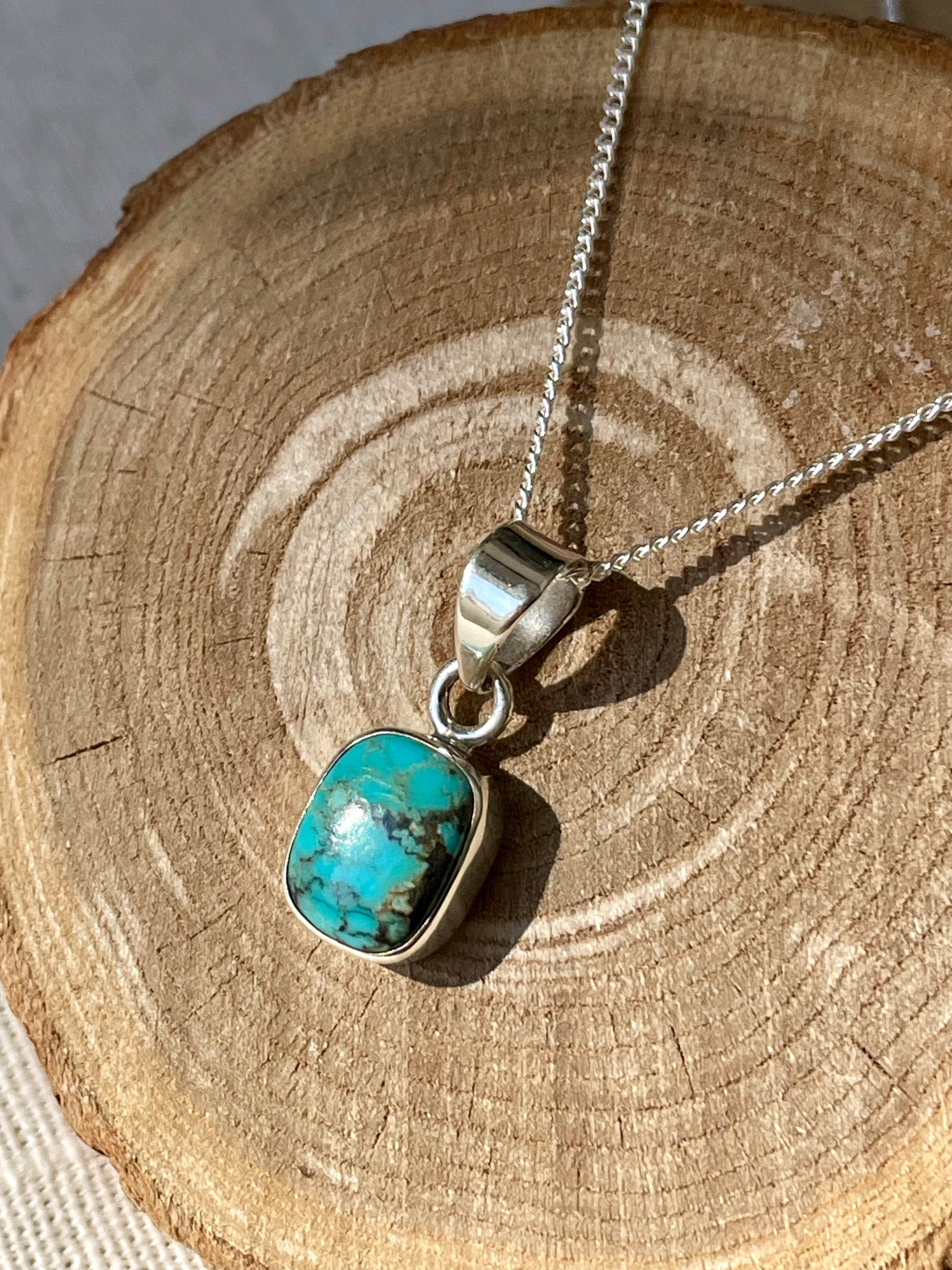 Pendentif en Turquoise du Tibet en pierres naturelles au soleil en argent 925